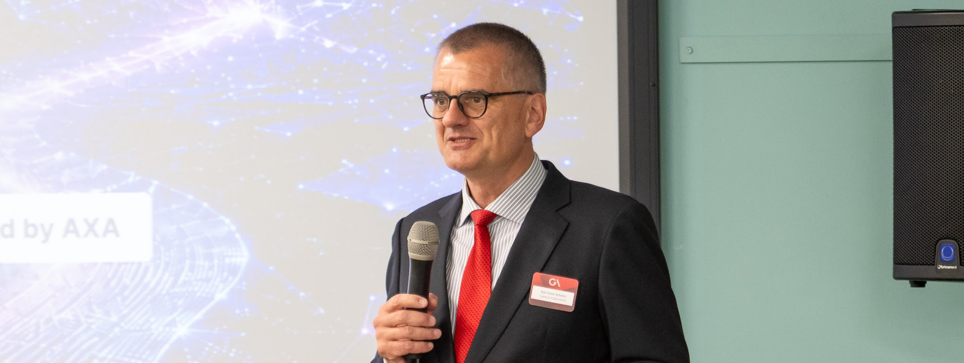 Chief Investment Officer at a podium, 2026 conference